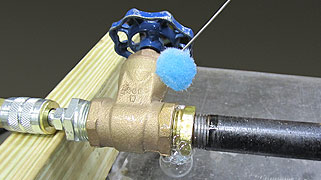 Microbubble leak detector being applied with a dauber